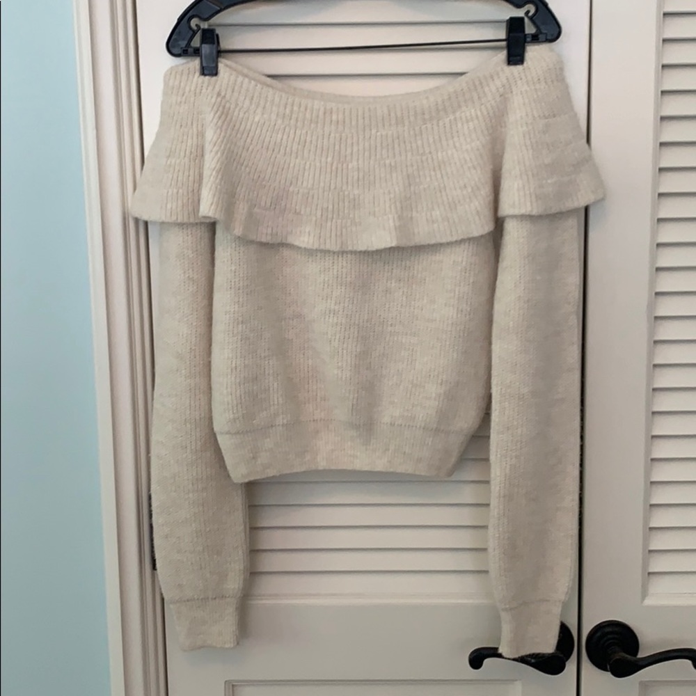 White off the shoulder sweater with ruffle